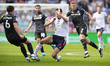 Eoin Toal #18 of Bolton Wanderers F.C. is being tackled by the opponent during the Sky Bet...
