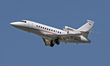 A Dassault Falcon 900EX from a private company takes off from Barcelona airport in Barcelo...