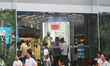 Customers shop at the China Li-Ning Sports Goods store on the pedestrian street of Nanjing...