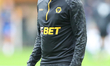 Jean-Ricner Bellegarde of Wolves warms up during the Premier League match between Wolverha...