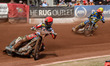 Belle Vue Aces' Jaimon Lidsey in red leads Sheffield Tigers' Jason Edwards in yellow durin...