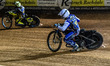 Sam McGurk of the Edinburgh Monarchs loses his steel shoe while chasing Dayle Wood of the...