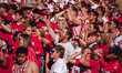 Fans look at the scoreboard in disbelief at Camp Randall Stadium in Madison, Wisconsin, on...