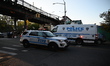 Four people are shot, including two bystanders and an NYPD officer, after two Brooklyn cop...