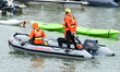 Sea rescuers on a boat monitor the descent on the Saone of the Lyon Kayak in Lyon, France,...
