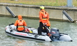 Sea rescuers on a boat monitor the descent on the Saone of the Lyon Kayak in Lyon, France,...