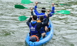 Participants in the Lyon Kayak descent race on the Saone in Lyon, France, on September 22,...