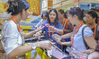 Visitors shop for Vietnamese food at the 21st China-Asean Expo in Nanning, Guangxi Zhuang...