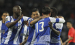 Porto's Portuguese forward Silvestre Varela (R) after scoring goal with teammates Porto's...