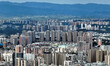 An aerial view shows high-rise buildings lining the riverside city in Yichang, Hubei, Chin...