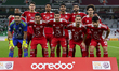 Al Arabi SC players pose for a team photo prior to the Ooredoo Qatar Stars League 24/25 ma...