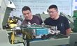 Buyers visit production equipment at the 17th China Handan (Yongnian) Fastener and Equipme...