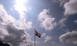 The Indian National Flag (Tri-Color) waves amid winds at the Line of Control in Kupwara, J...