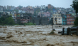 The swollen Nakkhu River inundates infrastructures built on its embankments in Lalitpur, N...