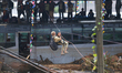 Nepal's Armed Police Force rescues a stranded person using a zipline rescue method from a...