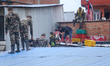 The Nepal Army conducts a rescue operation after a house is inundated by the swollen Bagma...
