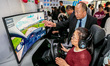 Students learn driving skills on an AI simulator at Landun Smart Driving School in Hua Cou...