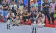 Children watch a robot performance at the 21st China-Asean Expo in Nanning, China, on Sept...