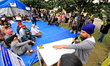 Organizer Amar Deep Singh speaks during a protest rally at an international students' enca...