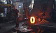 A worker works at an auto gear manufacturing company in Qingzhou Economic Development Zone...