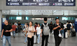 Passengers are seen in a waiting room at Nanchang Railway Station in Nanchang, China, on S...