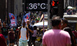 A street thermometer registers 36oC in the central region of Sao Paulo, Brazil, on October...