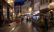 People walk on a street next to the Grand Place in Brussels, Belgium, on September 27, 202...