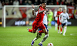 FC Twente defender Mees Hilgers and Fenerbahce midfielder Fred play during the match betwe...