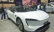 Visitors look at a HIMA LUXEED S7 electric car at the 2024 China (Tianjin) International A...