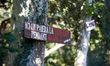 A placard on a tree on the Canal du Midi banks reads 'here, one pays the TGV tax for 40 ye...