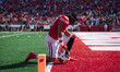 Wisconsin Badgers tight end Riley Nowakowski #37 takes a knee in the south end zone at Cam...