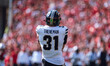 Purdue defensive back Dillon Thieneman #31 fumbles a second punt against the Wisconsin Bad...