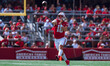 Wisconsin Badgers quarterback Braedyn Locke #18 throws a pass against the Purdue Boilermak...