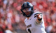 Purdue Boilermakers quarterback Hudson Card #1 lines up as a wide out against the Wisconsi...