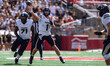 Purdue Boilermakers quarterback Hudson Card #1 throws a pass against the Wisconsin Badgers...