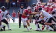 Wisconsin Badgers running back Cade Yacamelli #25 gives a stiff arm against the Purdue Boi...