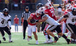 Wisconsin Badgers running back Cade Yacamelli #25 gives a stiff arm against the Purdue Boi...