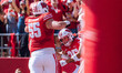 The Wisconsin Badgers celebrate a Cade Yacamelli #25 touchdown against the Purdue Boilerma...