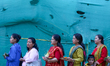 Nepali Hindu devotees stand in a queue to reach the Taleju Bhawani Temple in Kathmandu Dur...