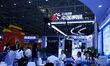 Visitors visit the booth of China Steel Research at the 9th China Advanced Materials Indus...