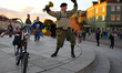 An elderly man is seen dancing on the Royal Castle square in Warsaw, Poland on 12 October,...