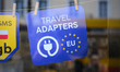 An advertisement for electric travel chargers is seen at a shop in Warsaw, Poland on 12 Oc...