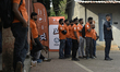 Swiggy gig workers stand during a promotional event in Mumbai, India, on October 14, 2024....