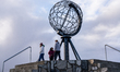 Tourists watches the steel globe in North Cape, Nordkapp, Norway on September 27, 2024. No...