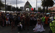 Dozens of people dressed in costume participate in the Zombie March in Mexico City, Mexico...