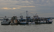 Boats park on the Hooghly River due to Cyclone Dana in Kolkata, India, on October 23, 2024...