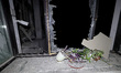 Plants sit on the windowsill of a shattered window in the 1930s Derzhprom building, which...