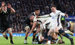 From left to right, Scott Barrett of New Zealand and Ben Spencer of England (Bath Rugby) a...