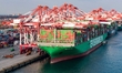 A global super-class container ship unloads containers at the Qianwan container terminal o...