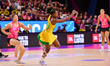 Zaudi Green of Jamaica (C) competes in the Fast5 Netball World Series match between New Ze...